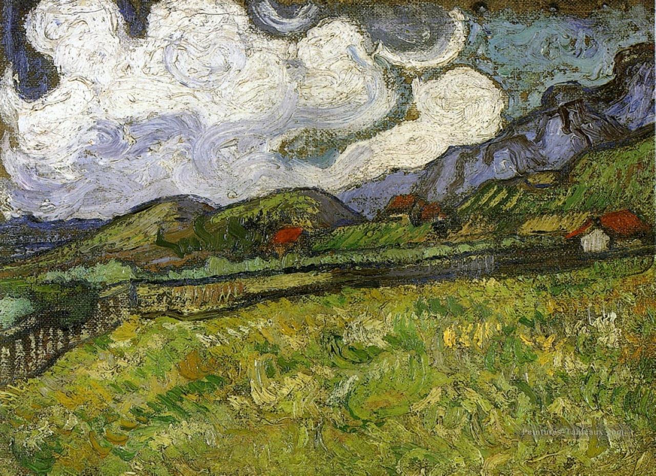 Champ de blé derrière l’hôpital Saint Paul avec une faucheuse Vincent van Gogh paysage Peintures à l'huile